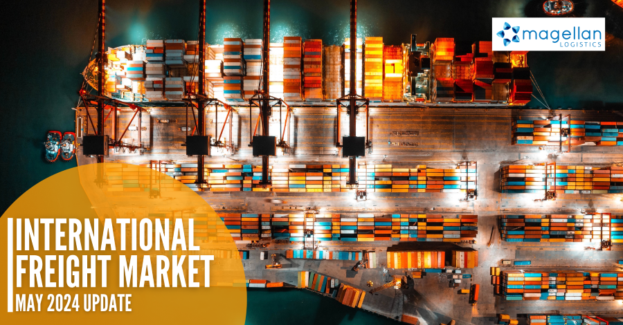 Freight Market Update - drone image of brightly lit a container port at night